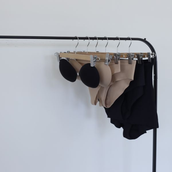 Henkaa underwear and bras hanging on a wardrobe