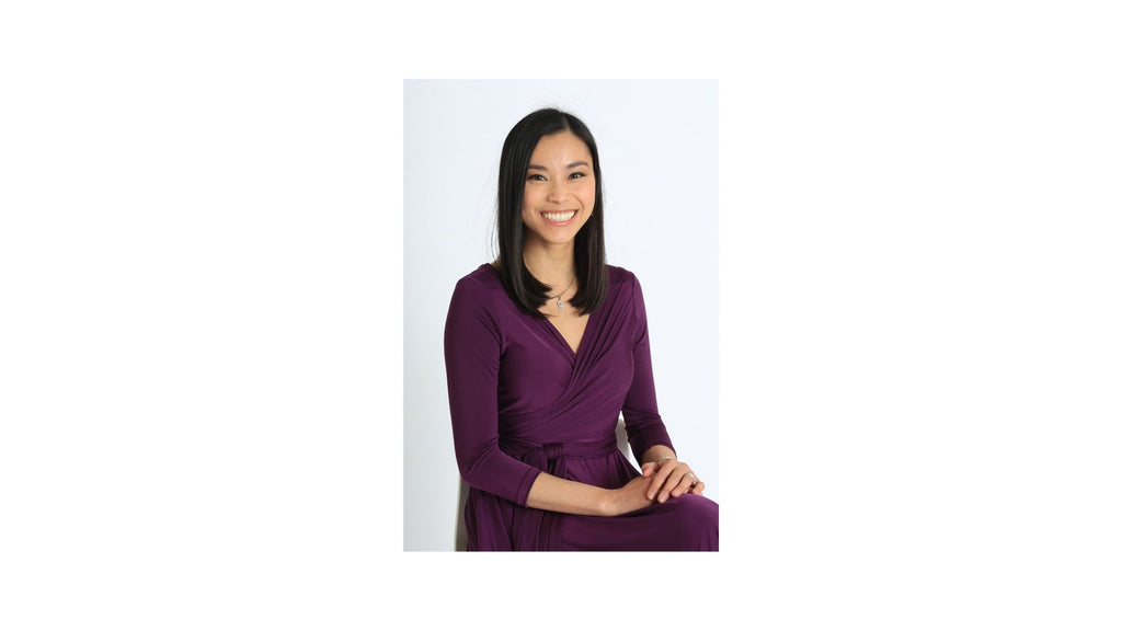 Joanna Duong Chang founder & CEO of Henkaa wearing Henkaa Iris dress in Plum Purple.
