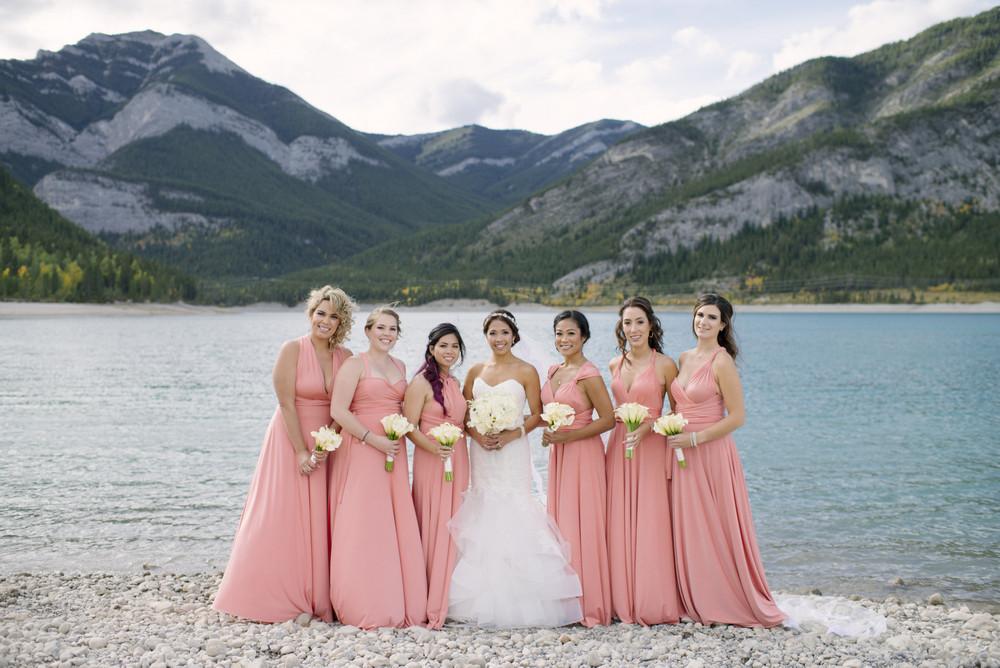 This beautiful classic, traditional wedding featuring peach pink coral bridesmaids dresses will have you swooning for days