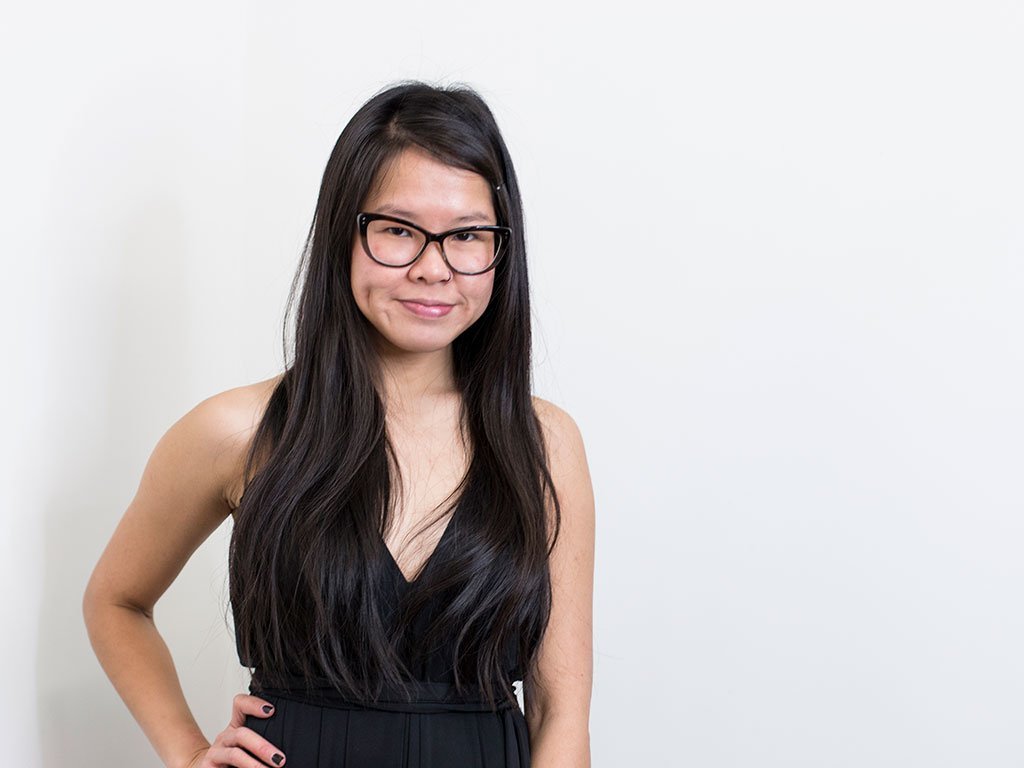 Samantha Wong Henkaa's Product Design & Development Lead wearing the Night Black Ivy Midi. 